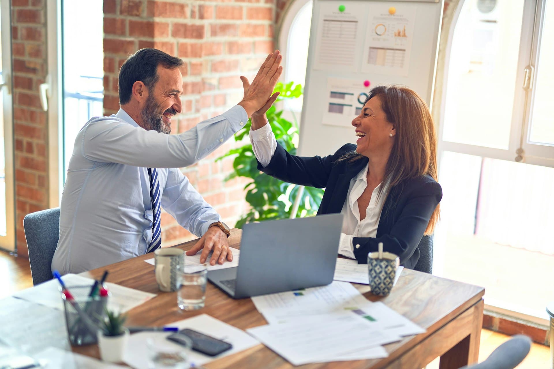 SEY Solutions Group consultants collaborating with clients
